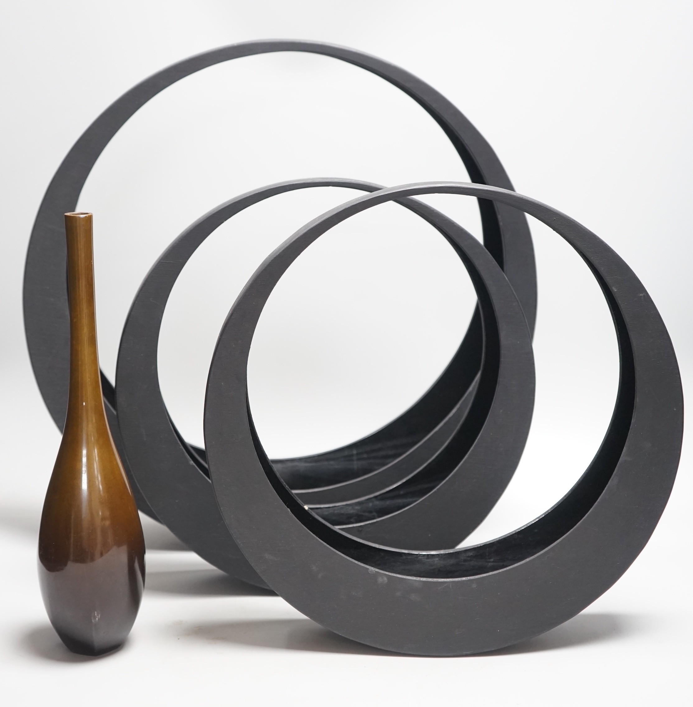 A Japanese bronze bottle vase, 30cm high, three circular black painted wooden abstract sculptures, possibly by Huw Powell Roberts, tallest 42.5cms